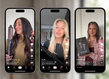 Vrouw met een salonwaardige blowout, gestyled met populaire TikTok haar tools van 2026.